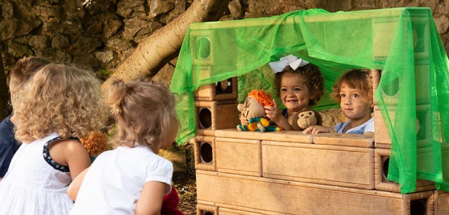 Children having a puppet show