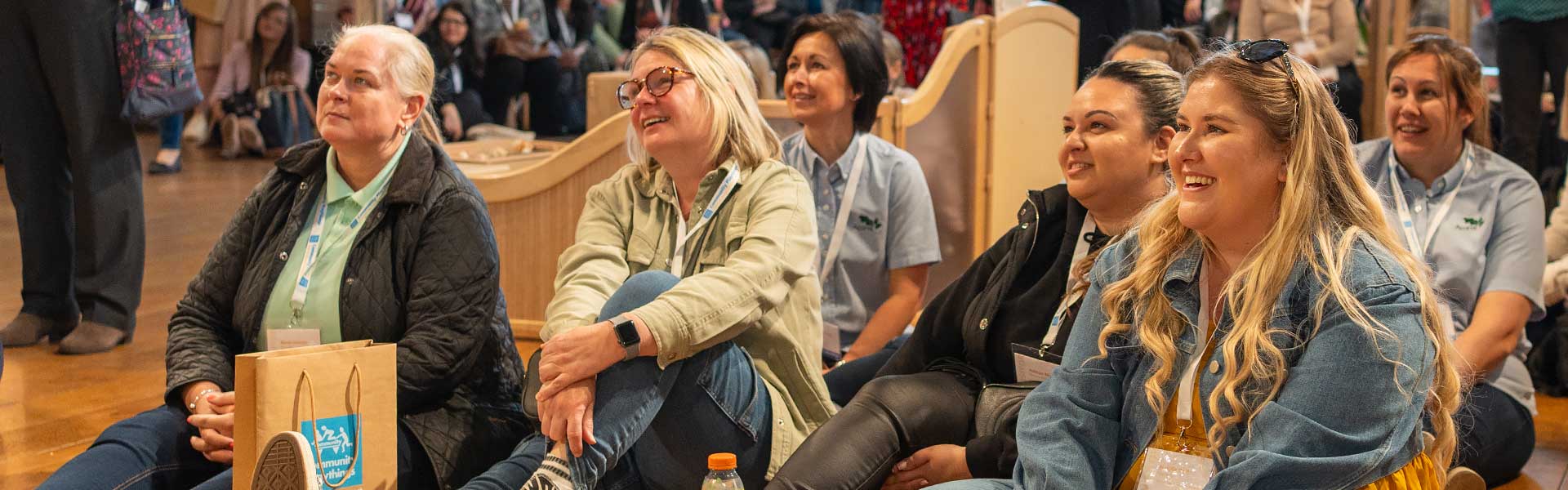 Attendees watching the keynote address