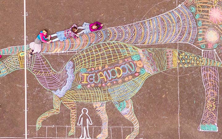 Dinosaur drawn on the pavement 