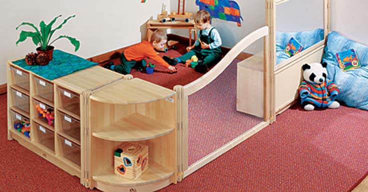 Children playing an an activity area created by using flexible furniture elements