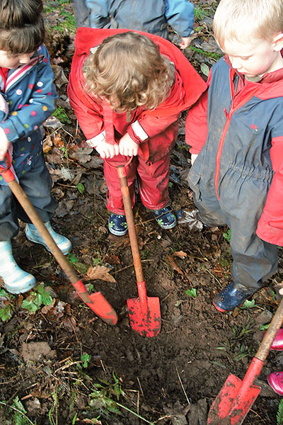 children digging a hole