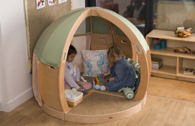 Two girls play in a FlexiDen Shell Cove