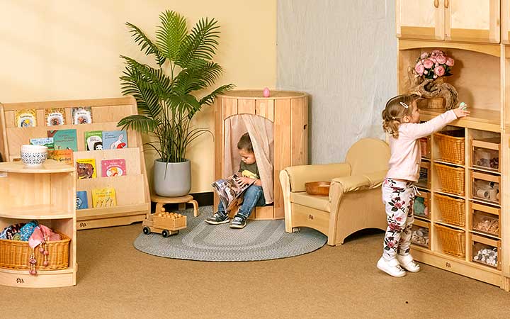 Child sits in Hollow Nook