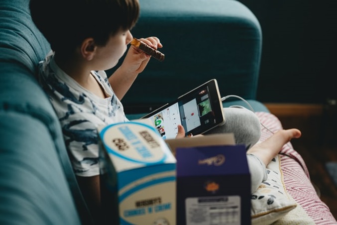 Child watching YouTube by Annie Spratt/Unsplash