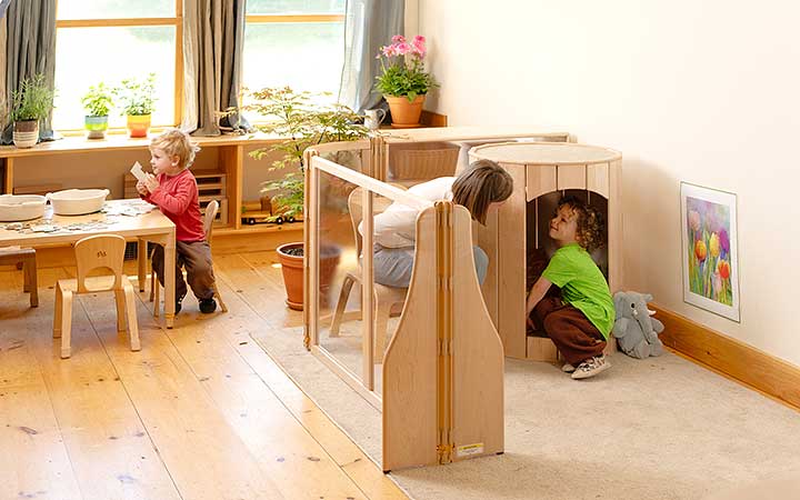 An inclusive environment set up with a calm corner and a solid wood Nook for a regulation space.