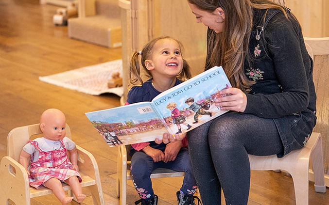 Teacher reading to a child