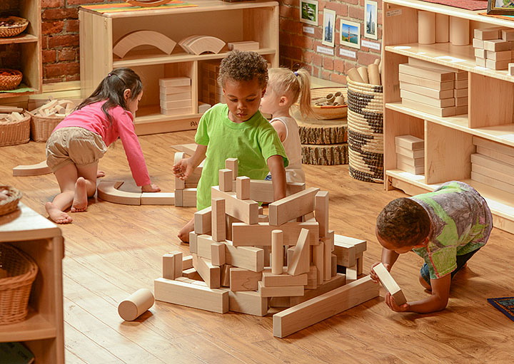 Children playing in block corner