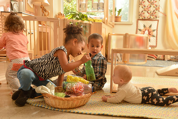 children with treasure basket