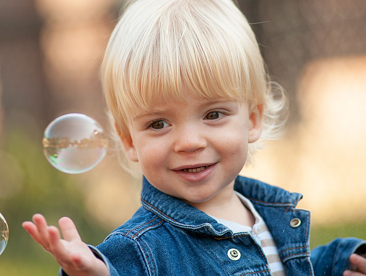 Child with soap bubble