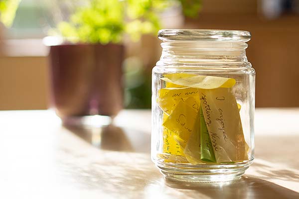 Jar with Post-it notes