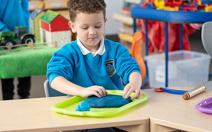 boy with playdough