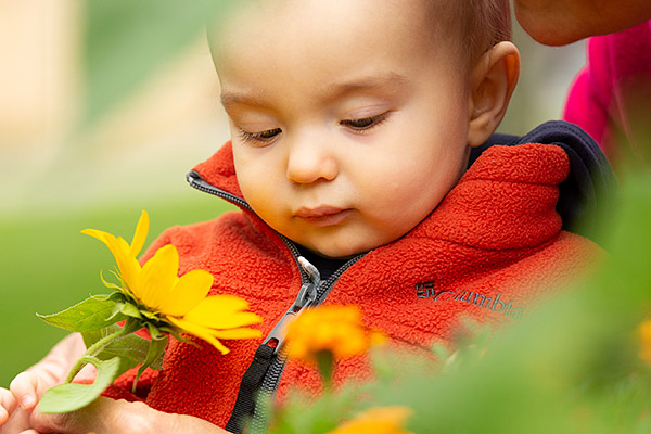 infant with flower