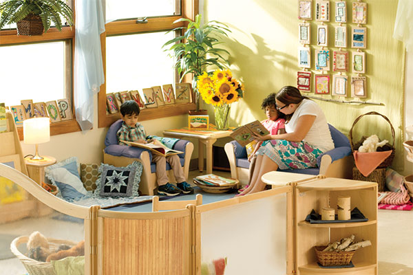 children reading in cosy corner with natural light