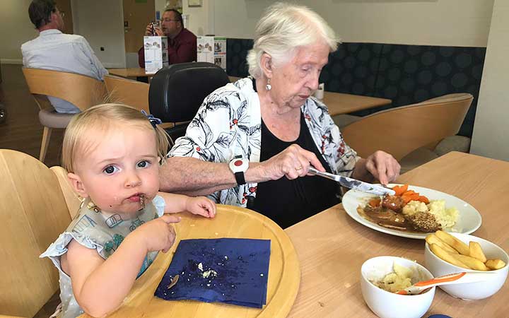 Irene and Pixie sharing lunch time