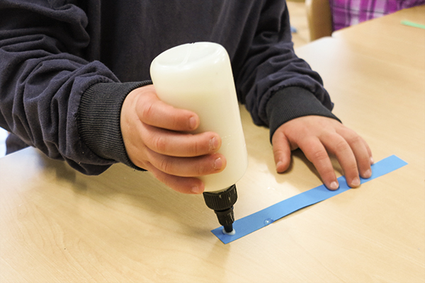 gluing paper strip for a paper chain