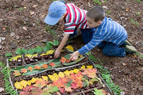 Boys making nature patterns