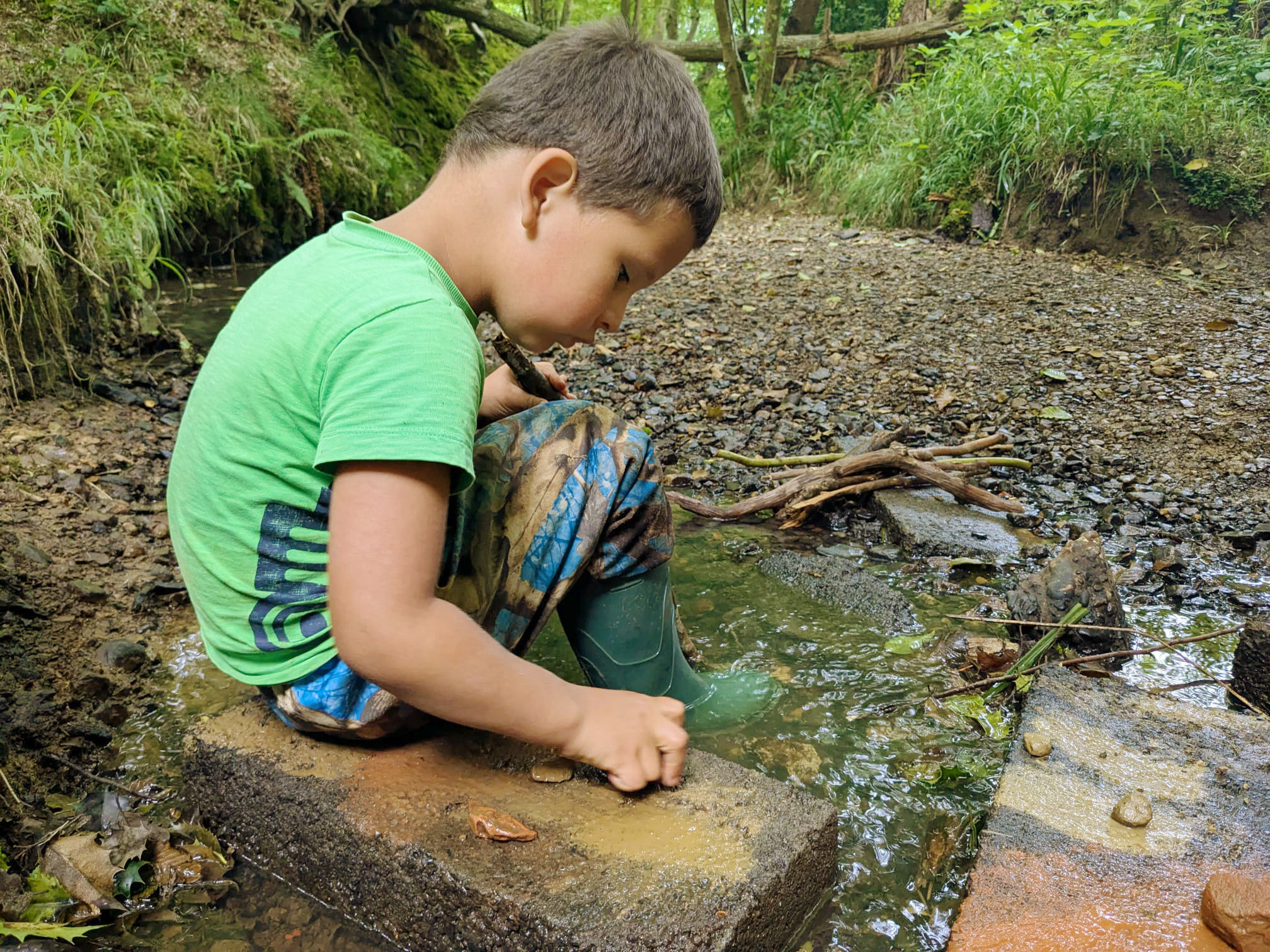 boy making rock paint