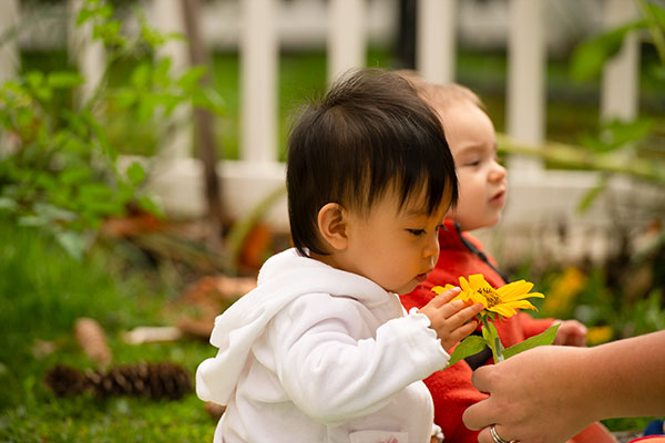 baby with flower