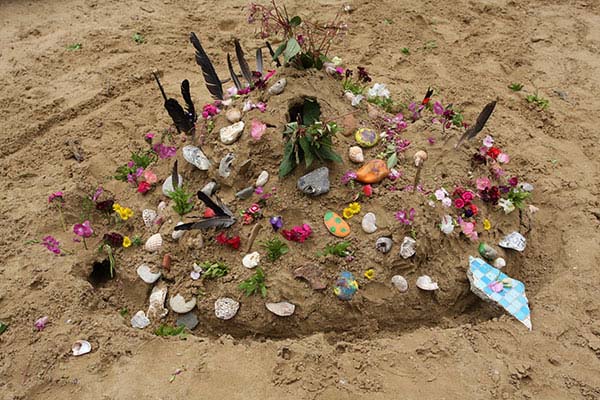 loose parts creation with natural materials in a sandpit