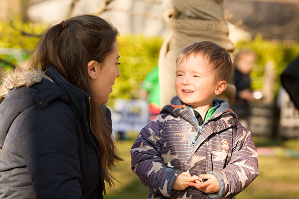 a teacher talking to a child