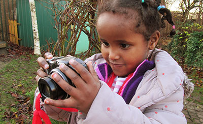 Three-year-old with camera