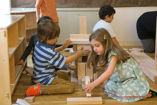 Children playing with unit blocks