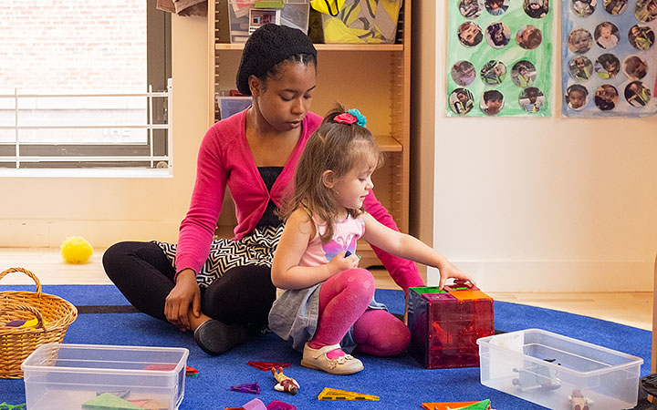 Teacher and child in a Reggio nursery