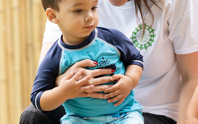 child with teacher