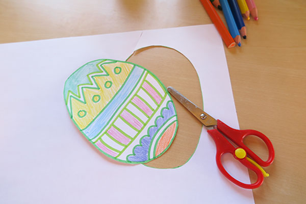 cutting out an Easter egg