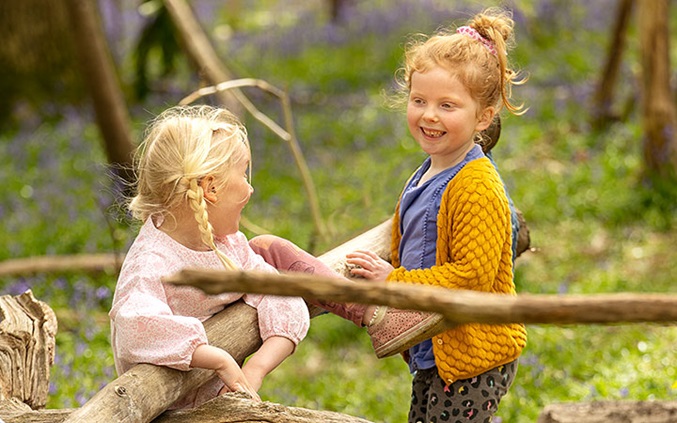 2 girls in bluebell wood