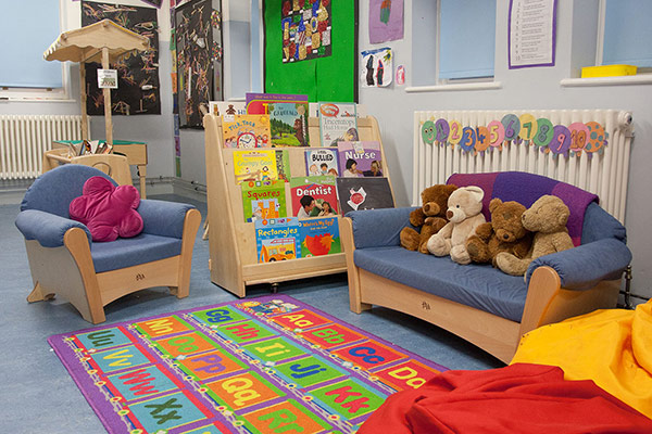 childsize sofa and armchair in a book corner