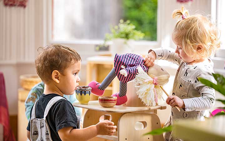 childsize sofa and armchair in a book corner