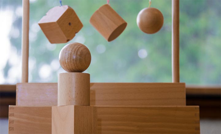 Wooden cube, cylinder and sphere