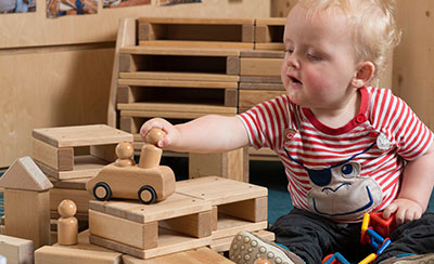 Toddler playing with villagers