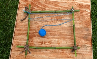 natural loom with strings attached