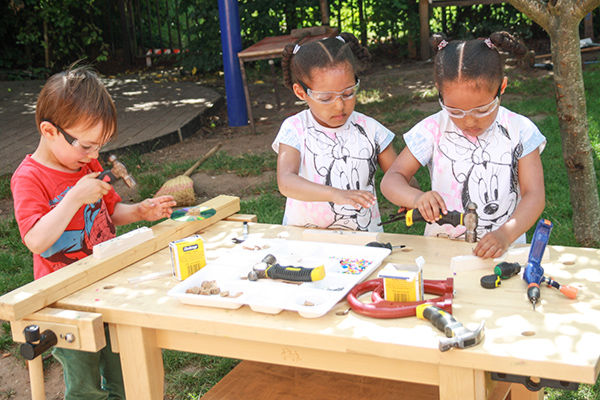 working with wood at the woodworking bench