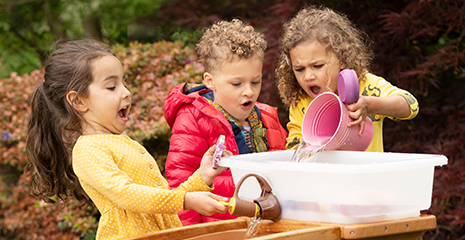 Children having fun with play equipment