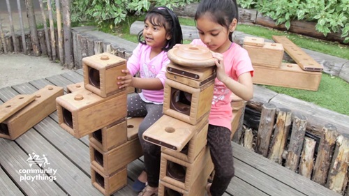 Children play on outlast blocks