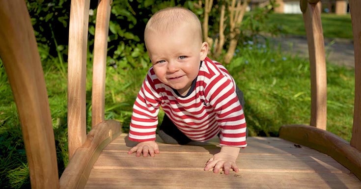 A child plays on the outlast bridge