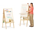 A practitioner flipping a chart on an easel