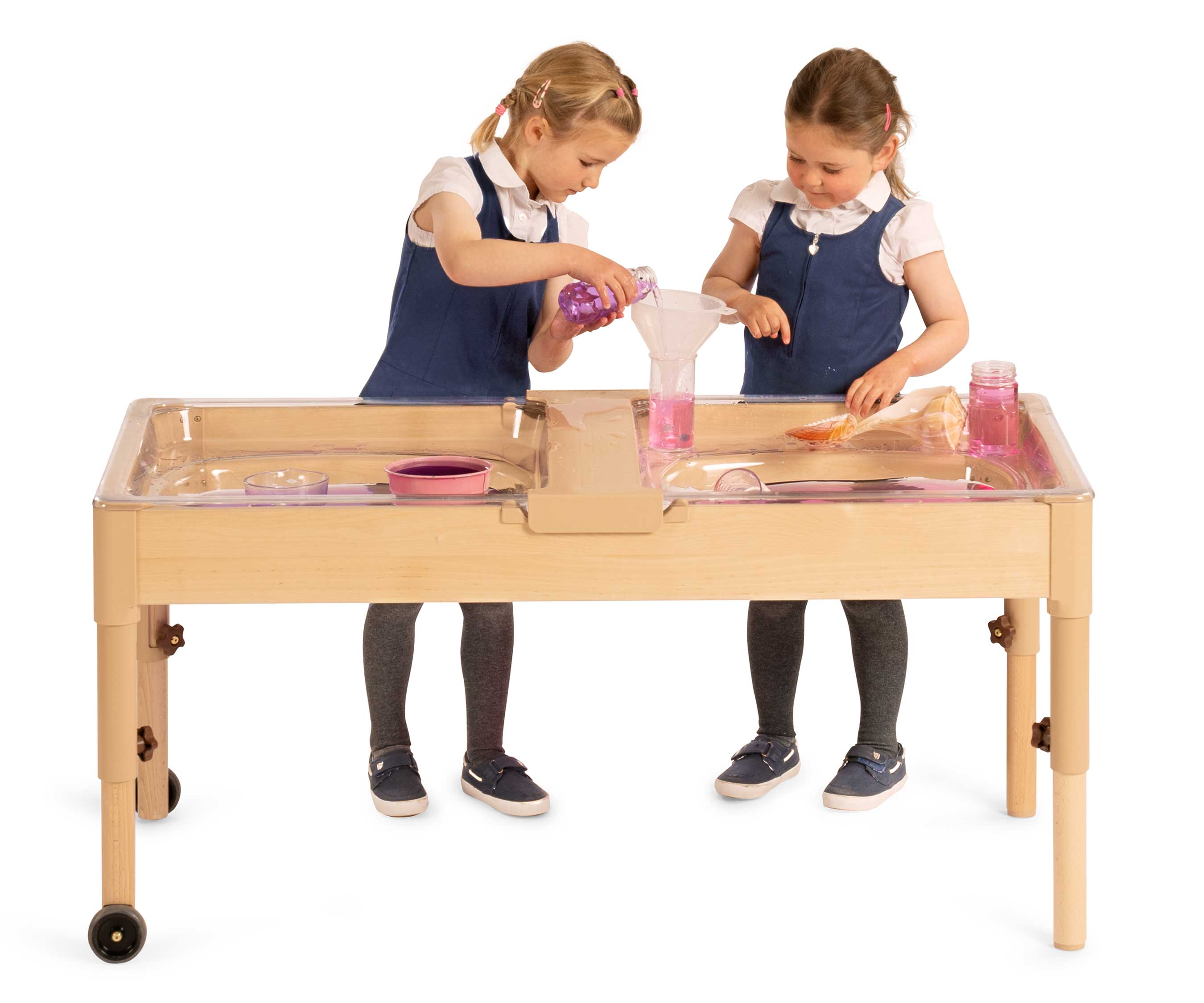 Two children play with Sand and Water table