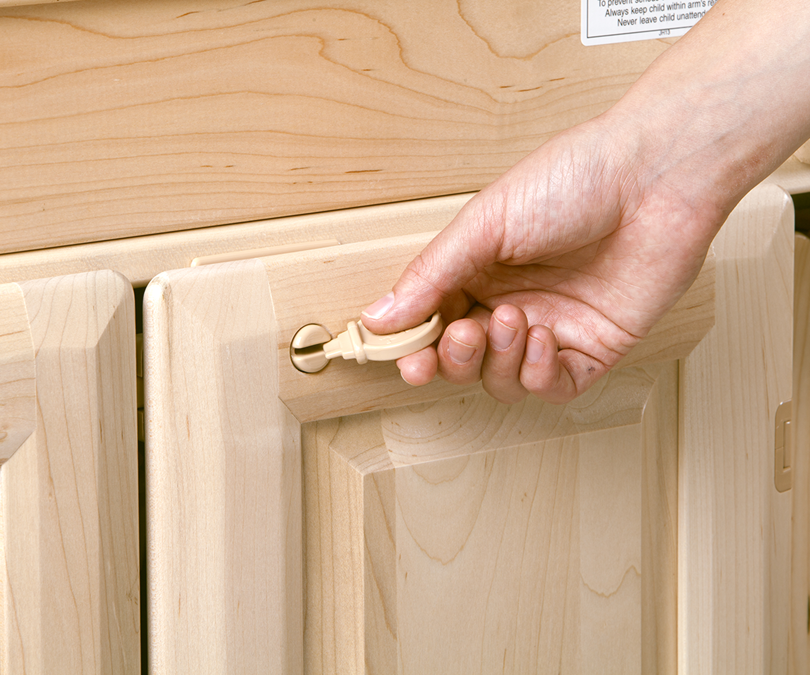 The child-proof latch on the changing table doors