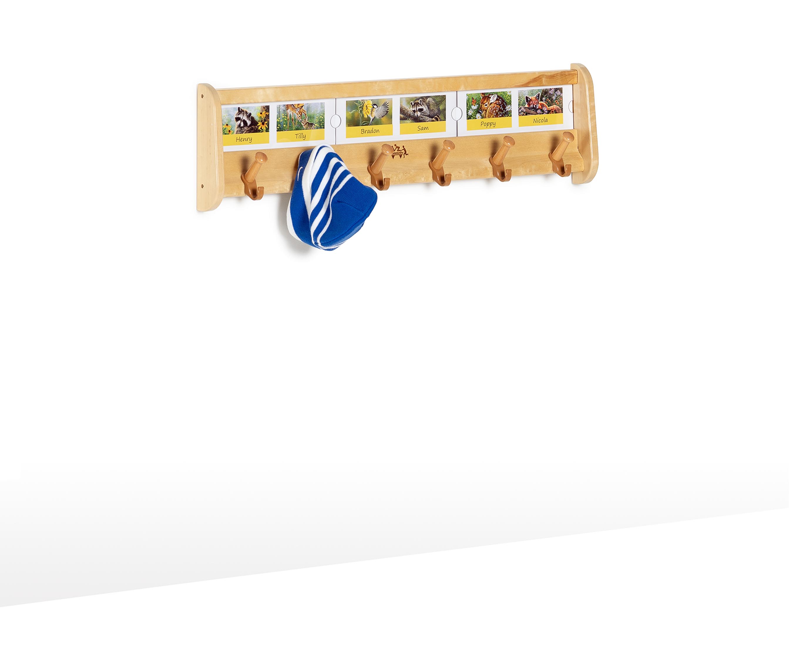 Wall pegs with labels propped