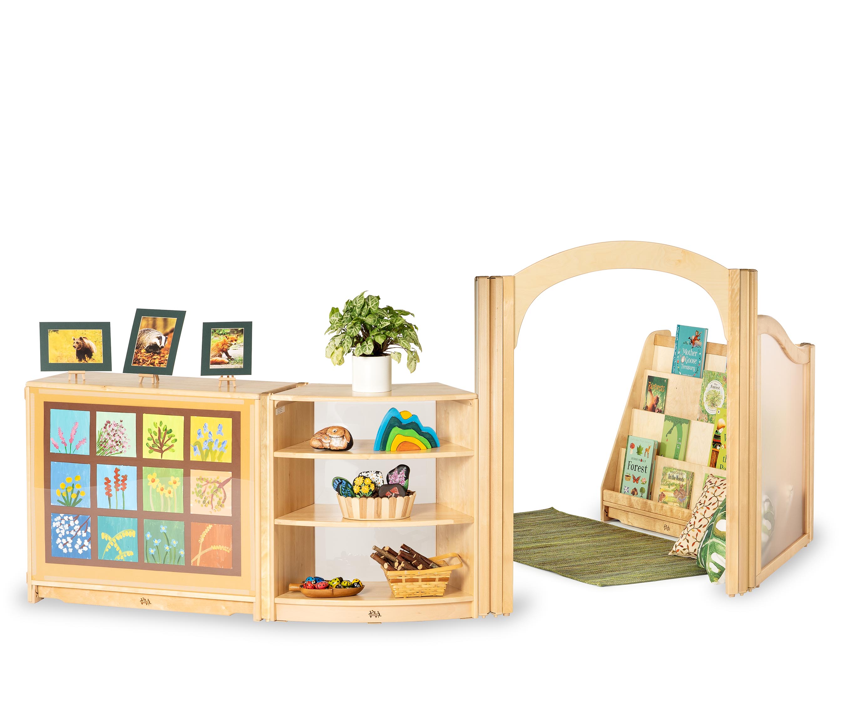 Natural wood literacy area for books and cosy corner with storage shelves and book display for Montessori, Reggio or EYFS classroom.