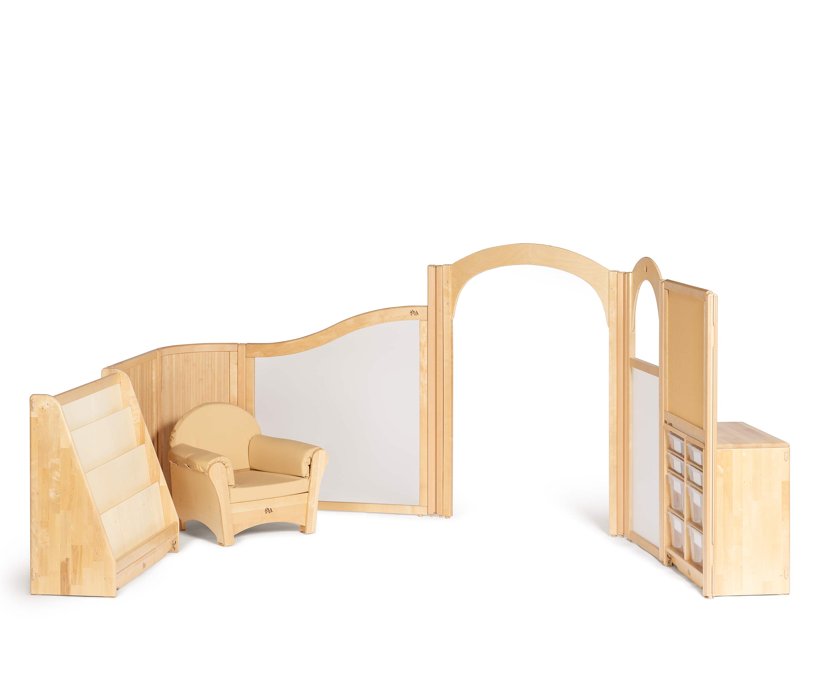 A reading area with a bookshelf and child-sized armchair.