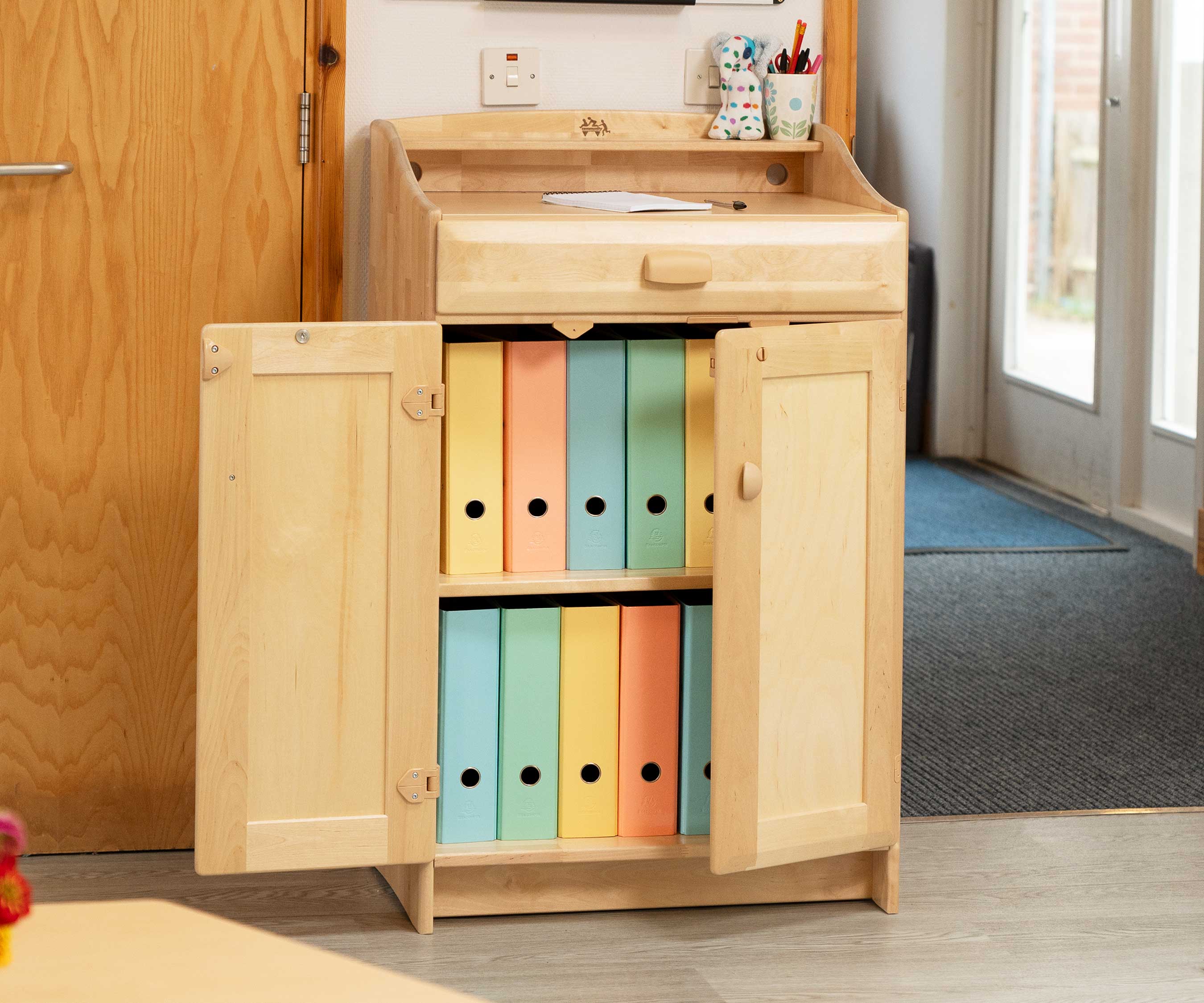 Open teacher standing desk full of A4-size folders
