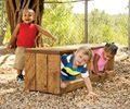 Three toddlers playing with Outlast storage bench