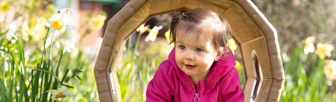 A child crawling through the Outlast tunnel