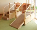 Solid wood toddler climbing frame with stairs, ramp, and tunnel, for large muscle play and active play indoors