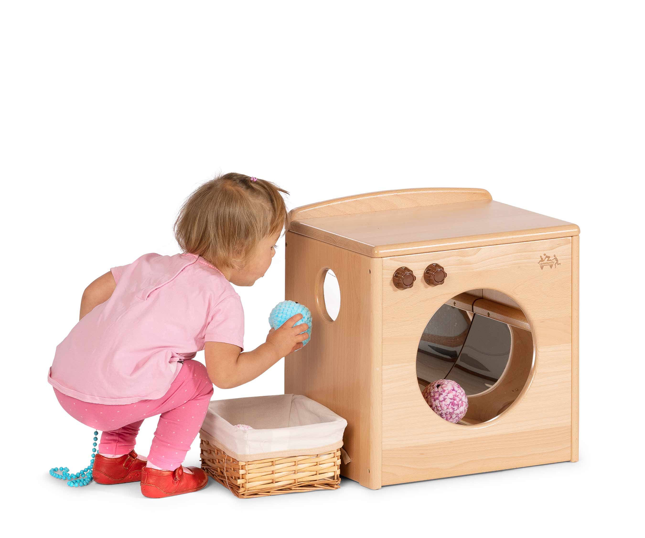 Child posting in washing machine